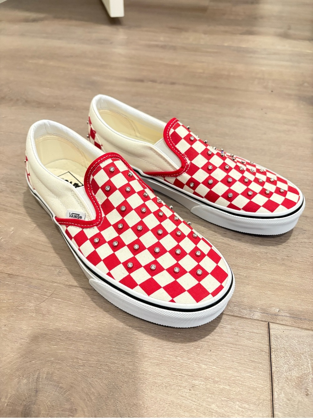 Vans Women’s Red and White Checkerboard Slip-On with Studs